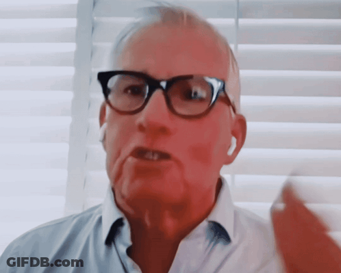 Man Talking With Glasses And Ear Buds GIF