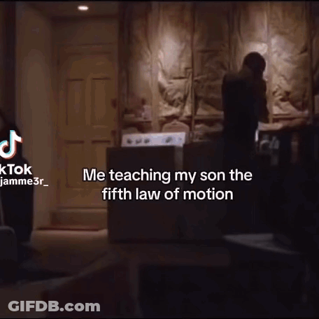 Man Teaching Son Fifth Law Of Motion In Dark Room GIF