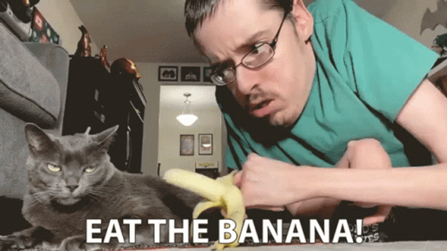 Man Teasing Banana Cat Meme GIF