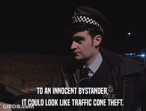 Man Telling Bystander It Could Look Like Traffic Cone Thefts GIF
