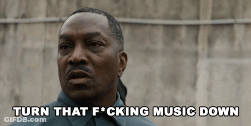 Man Telling Someone To Turn Music Down GIF