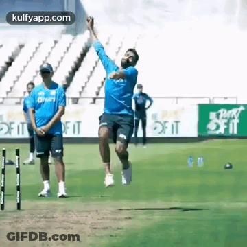 Man Throwing Ball In The Air On Field GIF