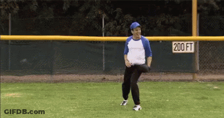 Man Throwing Baseball On Field With 200Ft Sign GIF