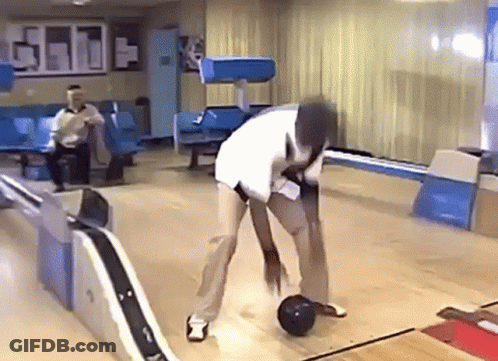 Man Throwing Bowling Ball On Bowling Alley GIF