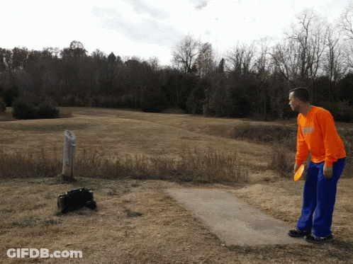 Man Throwing Frisbee In Orange Georgia Shirt GIF