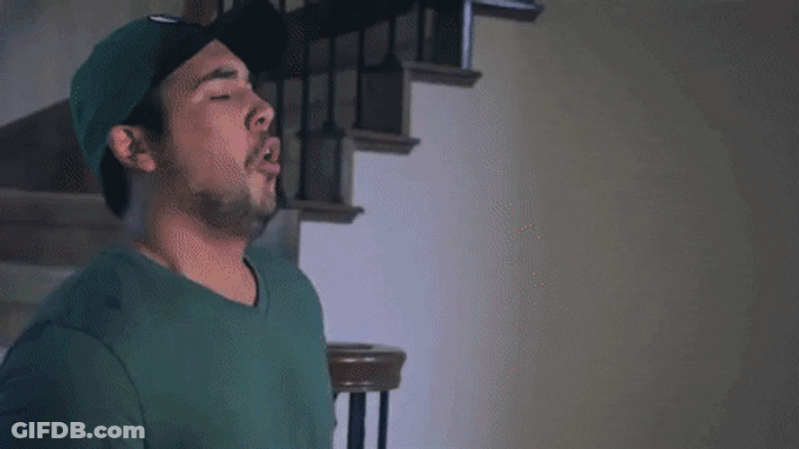 Man Throwing Up Rainbow GIF