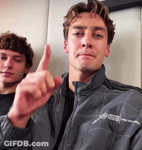Man Thumbs Up Beside Man In AMG Jacket GIF