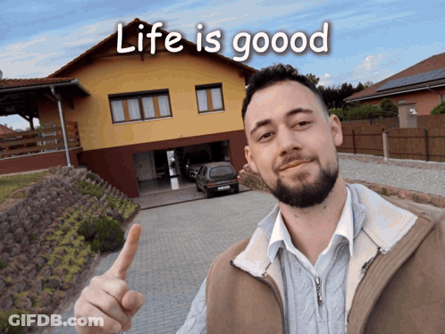 Man Thumbs Up In Front Of Life Is Good House GIF