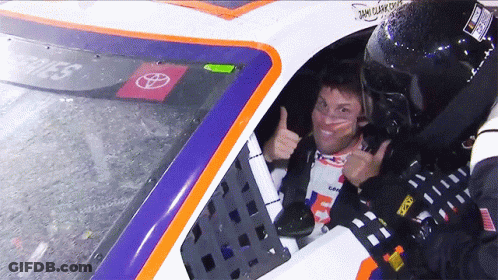 Man Thumbs Up In Race Car GIF