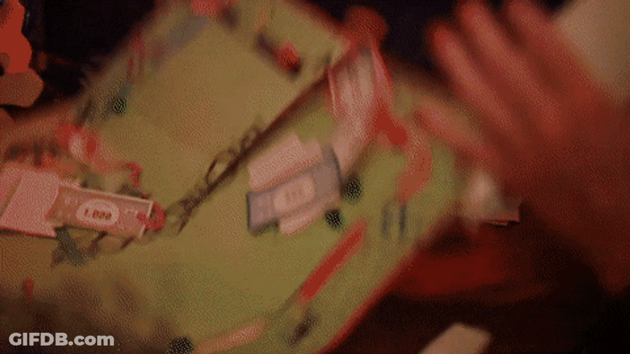 Man Tossing Monopoly Money And Board GIF