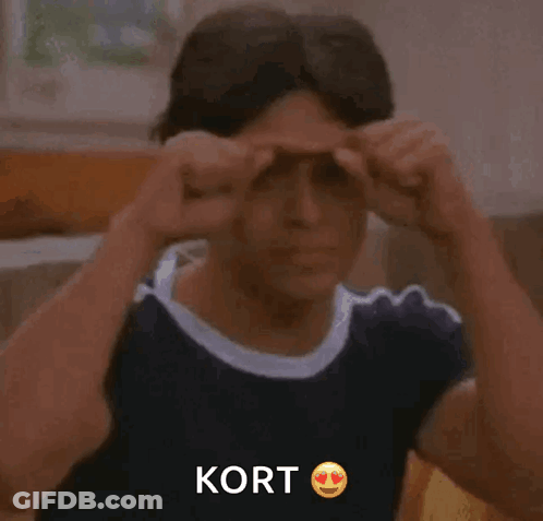 Man Touching Forehead With Word Kort GIF