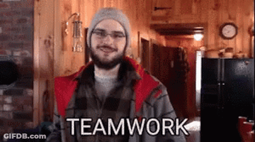 Man Touching Hands Saying Team Work GIF