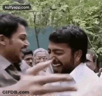 Man Touching Other Man's Nose GIF
