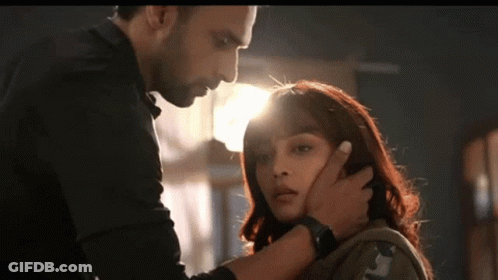 Man Touching Woman Face And Neck GIF