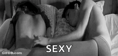 Man Touching Woman's Butt On Bed GIF