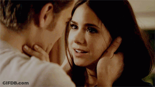 Man Touching Woman's Face GIF