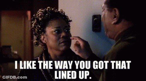 Man Touching Woman's Face Saying I Like The Way You Got That Lined Up GIF