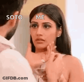 Man Touching Woman's Face GIF