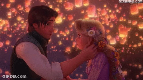 Man Touching Woman's Hair In Tangled GIF