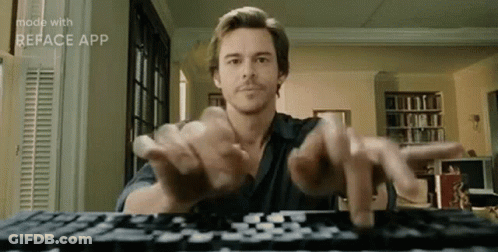 Man Typing On Keyboard With Hands Outstretched GIF