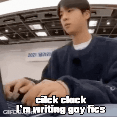 Man Typing On Laptop At Desk GIF