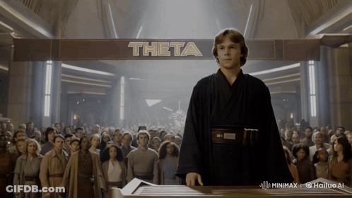 Man Under Theta Sign In Front Of Crowd GIF