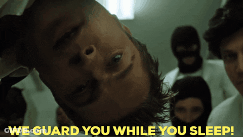 Man Upside Down Saying We Guard You While You Sleep GIF
