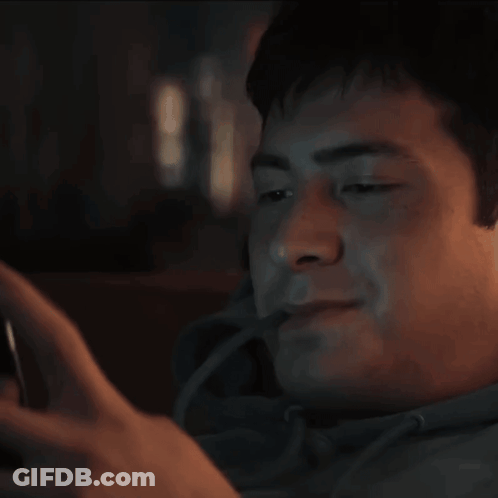 Man Using Cell Phone GIF