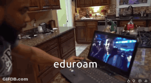 Man Using Laptop With Eduroam GIF