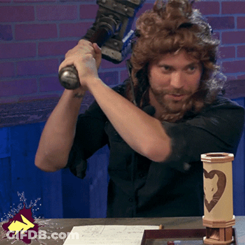 Man Using Whack A Mole Hammer GIF