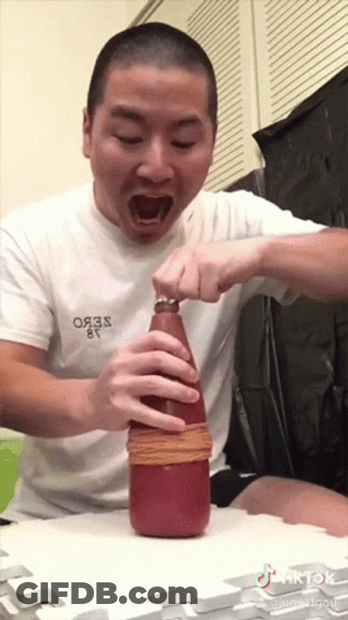 Man Vomits Ketchup GIF