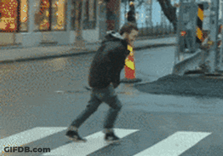 Man Walking Against Wind GIF