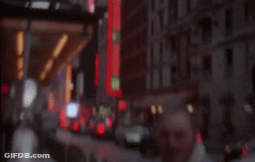 Man Walking City Street GIF