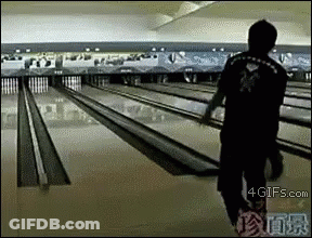 Man Walking Down Bowling Alley GIF