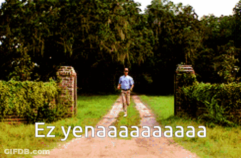 Man Walking Down Dirt Road Saying Ez Yenaaa Aa Aa GIF