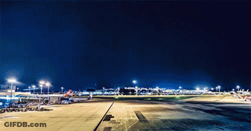 Man Walking Down Escalator Exit Sign GIF
