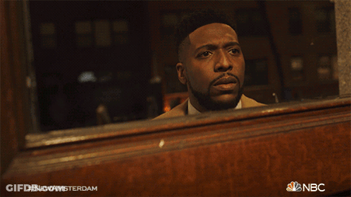 Man Walking Down Hallway With NBC Logo GIF
