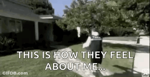 Man Walking Down Sidewalk GIF