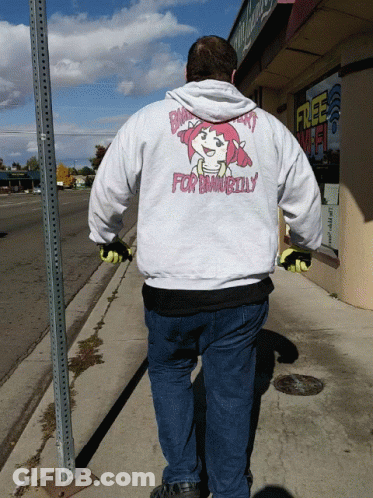 Man Walking Down Sidewalk In For Bama Billy Hoodie GIF