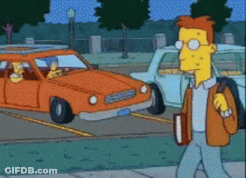 Man Walking Down Sidewalk In Front Of Car GIF
