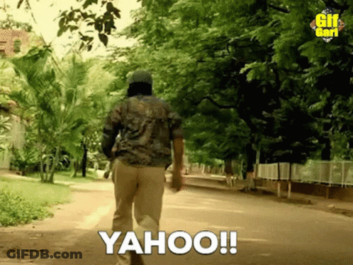 Man Walking Down Street With Yahoo GIF