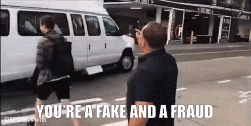 Man Walking Down Street Youre Fake And Fraud GIF