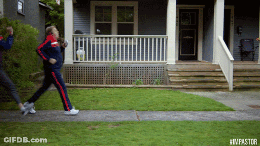 Man Walking Fast Trying To Outrun Woman GIF