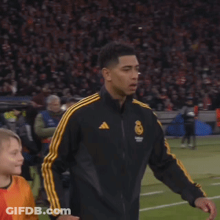 Man Walking In Black And Yellow Striped Jacket GIF