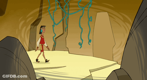 Man Walking In Cave With Vines GIF