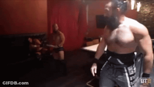 Man Walking In Wrestling Match GIF