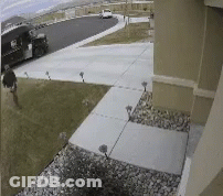 Man Walking Next To Delivery Truck GIF