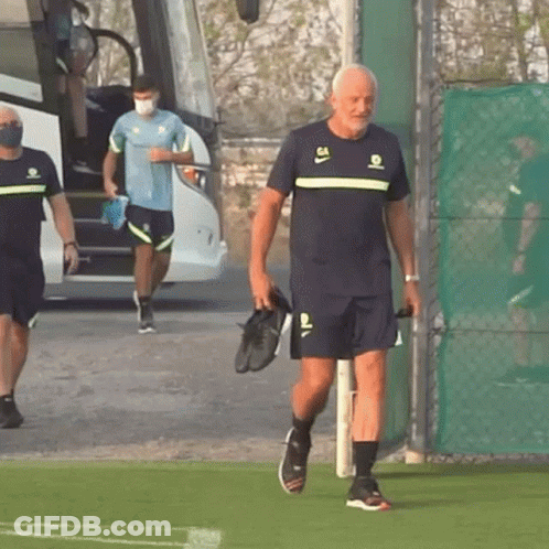 Man Walking On Field In Number 64 Shirt GIF