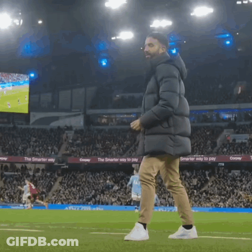 Man Walking On Soccer Field With The Smarter Way To Pay Sign GIF