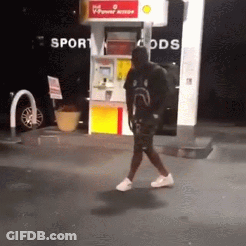 Man Walking Past Gas Pump Saying Sport Goods GIF